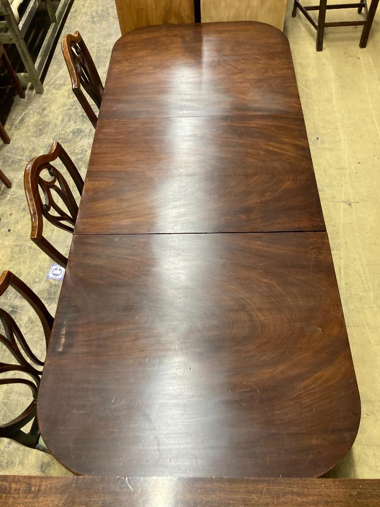 A George IV mahogany twin pedestal dining table, 220cm extended, one spare leaf, width 91cm height 72cm